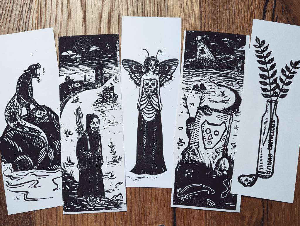 Collection of 5 lino printed bookmarks each depicting a bit of Glossop folklore (real and invented0